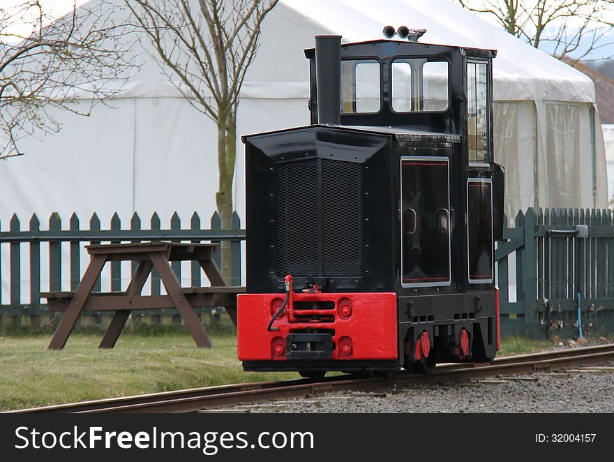 A Train Diesel Engine on a Narrow Gauge Railway.