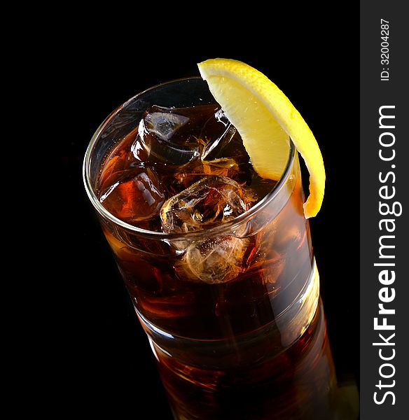 Cocktail with ice cola whiskey