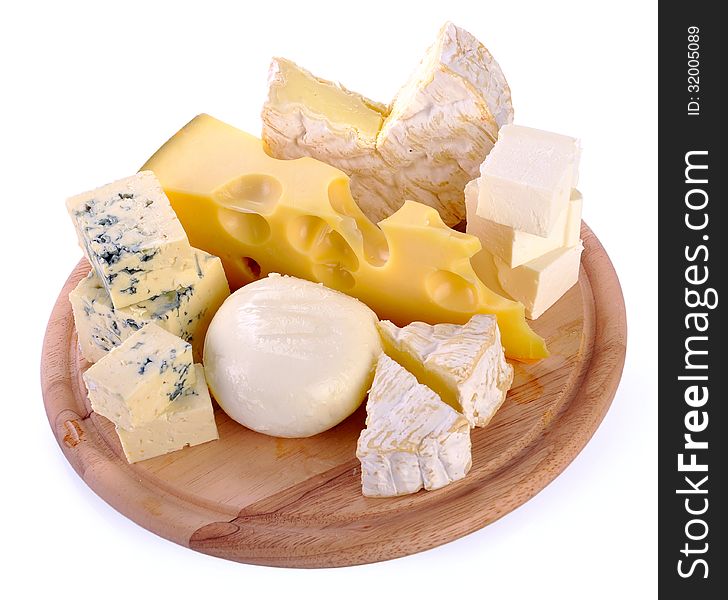 A set of cheese on a wooden board