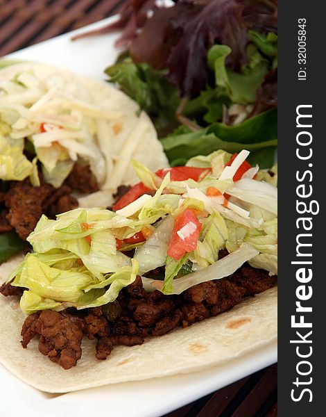 Mexican beef soft tacos closeup. Mexican beef soft tacos closeup