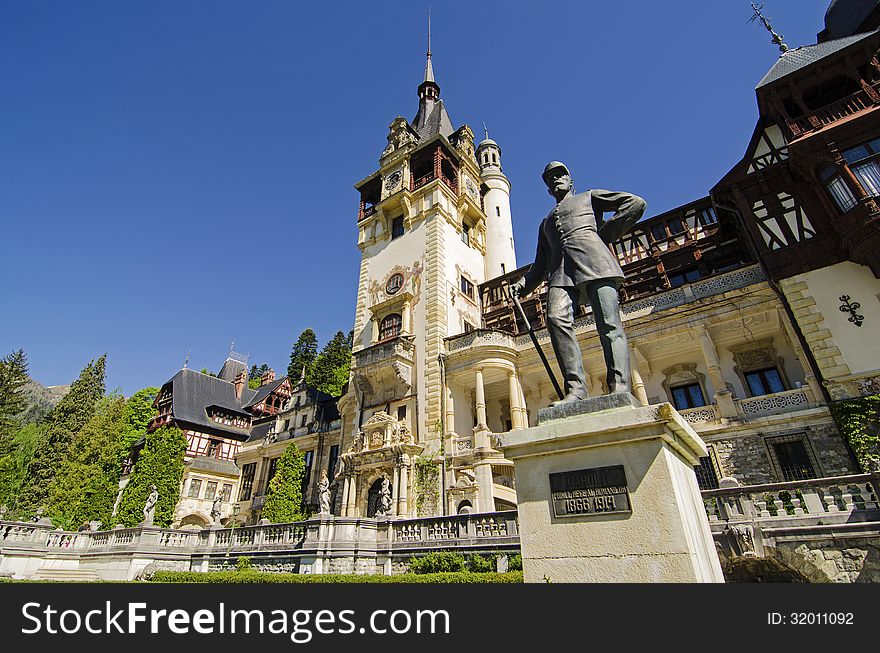 King carol I statue in front of peles castle, romania