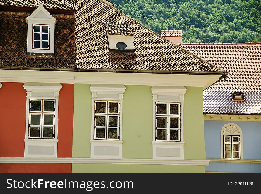 Different colors painted houses in brasov, romania. Different colors painted houses in brasov, romania