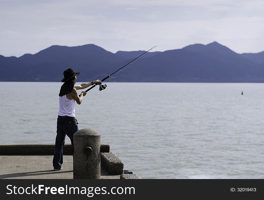 Fisherman fishing trolling in the sea