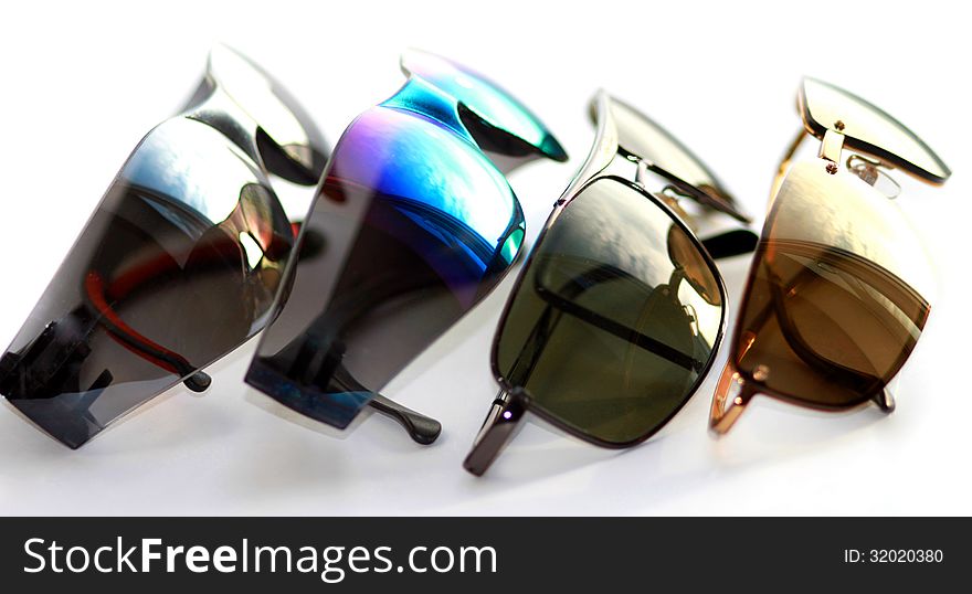 Rainbow sun glasses on a white background