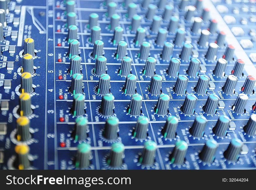 Closeup of sound mixer panel.