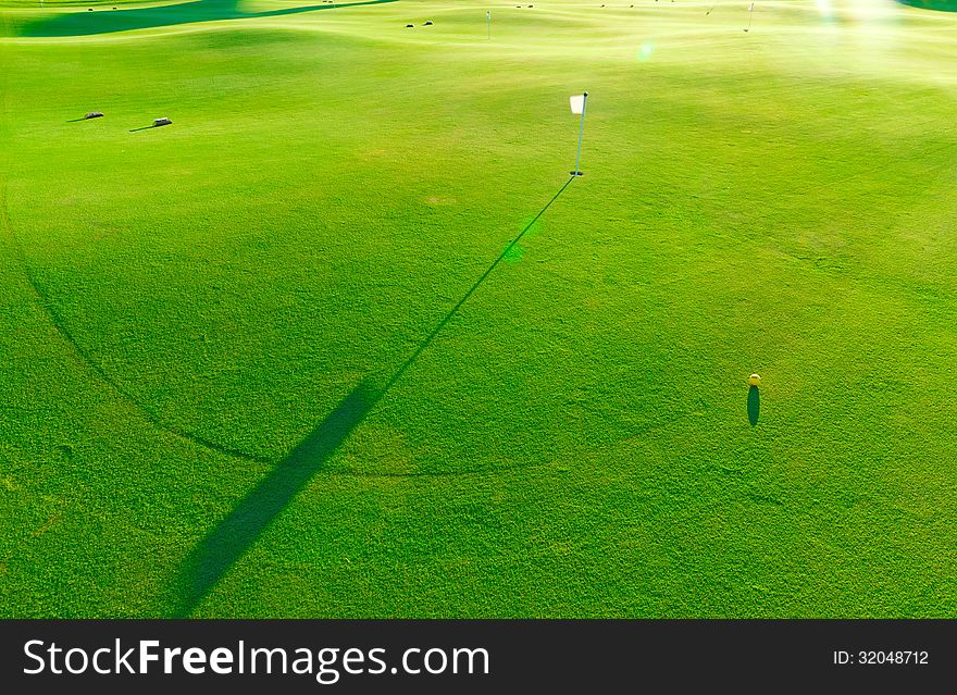 Photo golf courses with bright green grass. Photo golf courses with bright green grass