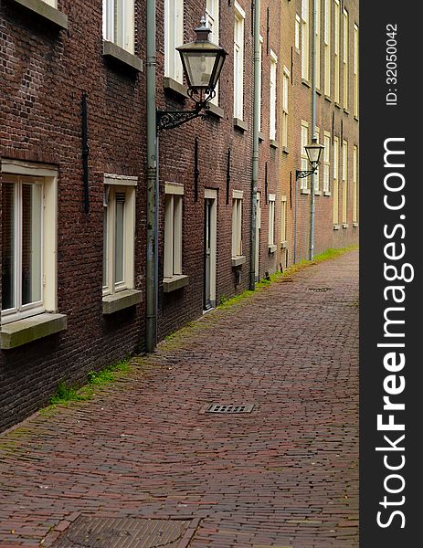 A Deserted Cobbled Backstreet In A European City. A Deserted Cobbled Backstreet In A European City