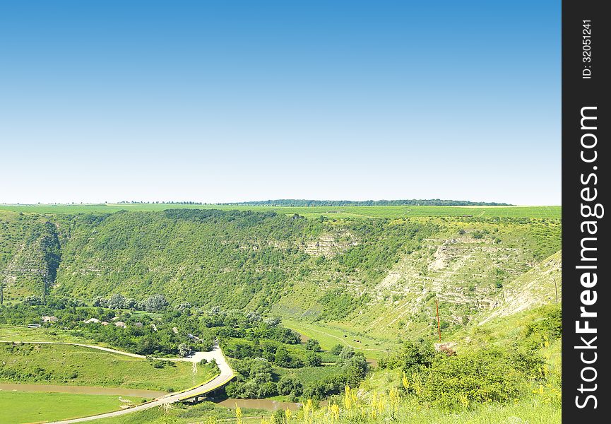 River Channel Extending Along A Steep Bank