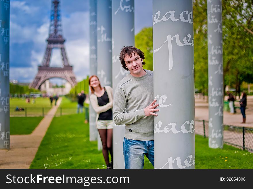 Lovers in Paris with the Eiffel Tower in the Background. Lovers in Paris with the Eiffel Tower in the Background