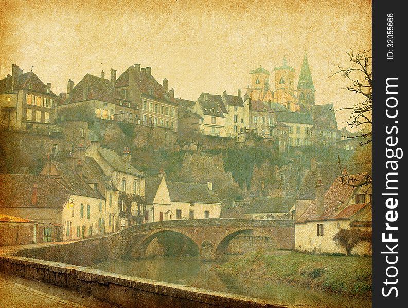 Semur-en-Auxois. Burgundy, France. Photo in retro style. Paper texture.