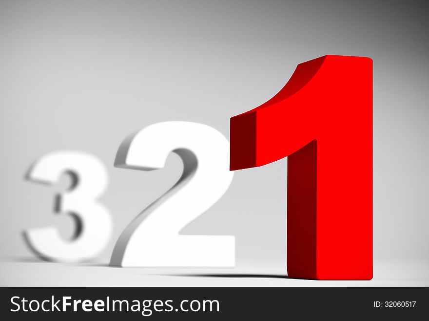Numbers three two and red one over a grey background with depth of field effect. 3D render with depth of field effect. Numbers three two and red one over a grey background with depth of field effect. 3D render with depth of field effect