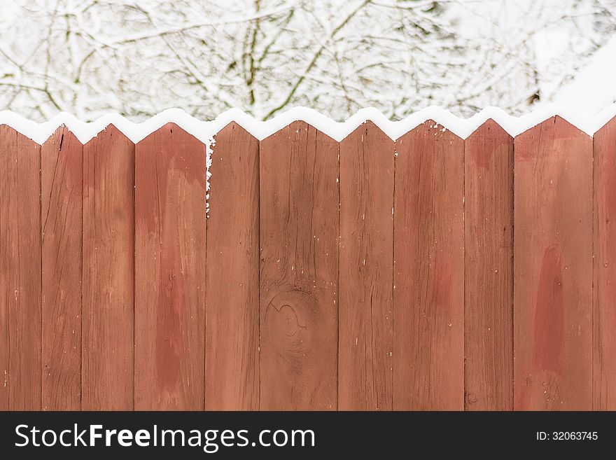 Old Wooden Fence In A Snow