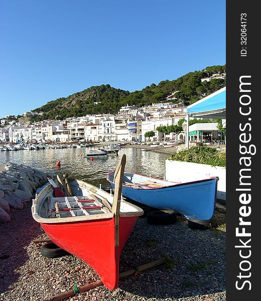 Two boats on the shore of the Mediterranean Sea.