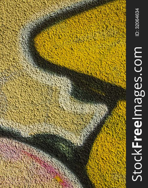 Close-up texture of wall with graffiti in urban setting. Close-up texture of wall with graffiti in urban setting