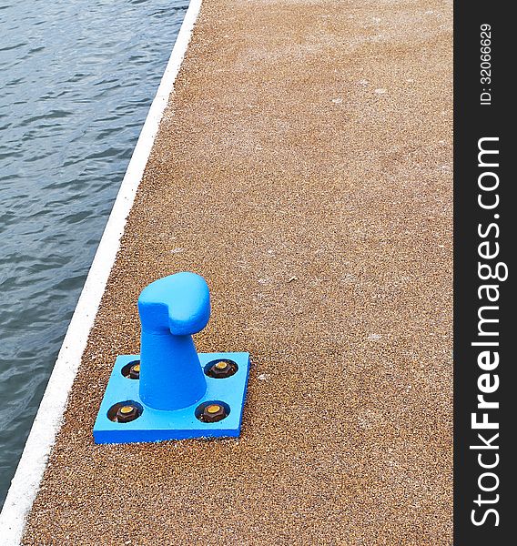 Blue bollard in the harbour of la spezia