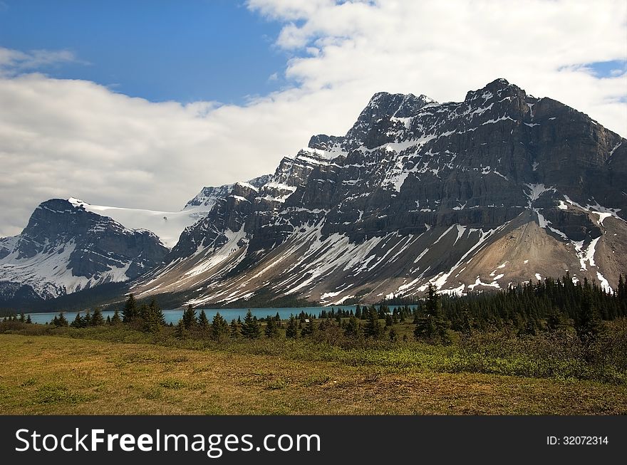 Magnificent views of the Canadian Rocky Mountains and glacial lake at the foot of them, Alberta, Canada