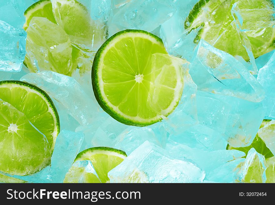 Lime slices in pieces of ice. Lime slices in pieces of ice