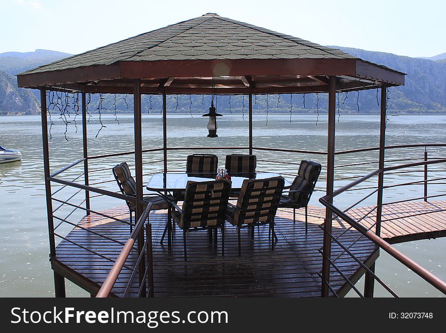 Waterfront terrace wooden floors and banister protection