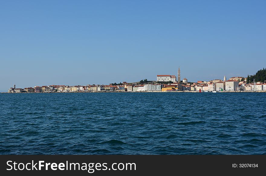 Panoramic view of town Piran from a boat