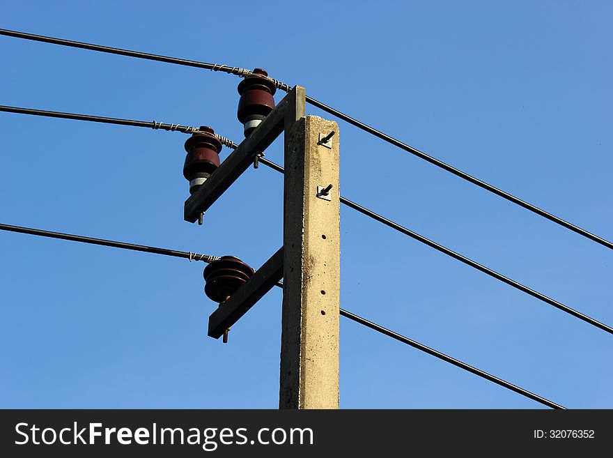 Electricity post in blue sky. Electricity post in blue sky