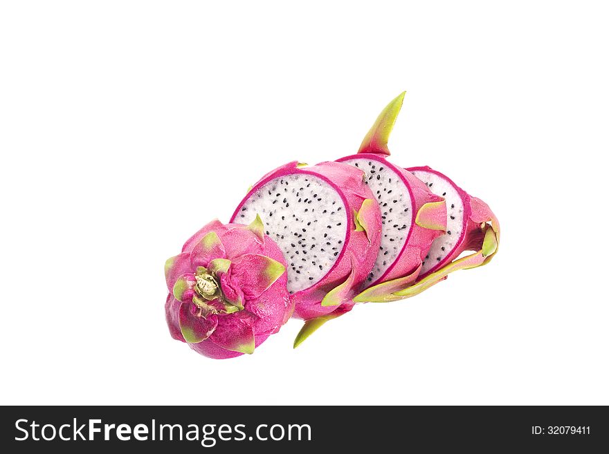 Close-up of sliced dragon fruit isolated on white