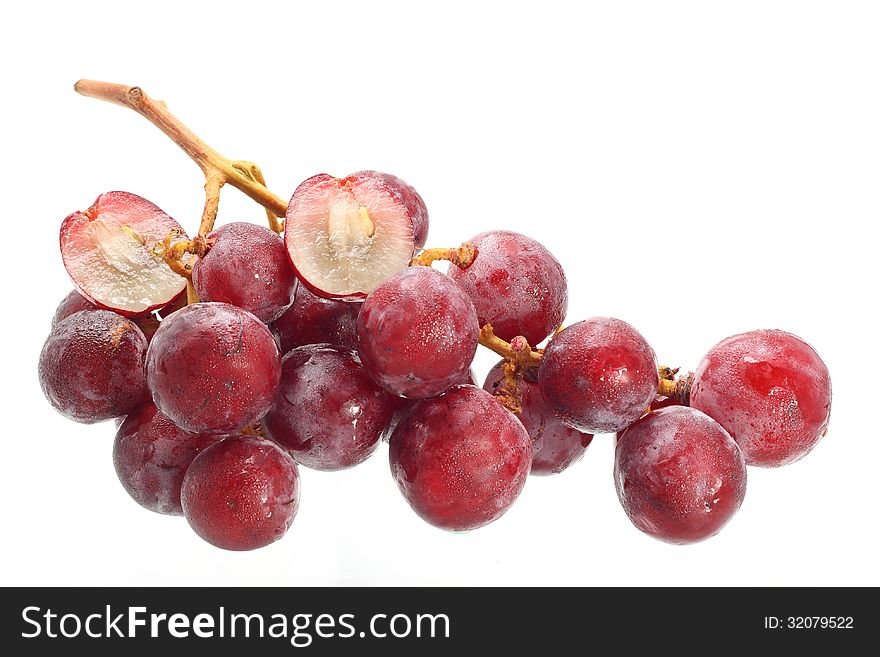 Bunch of red grapes isolated on white