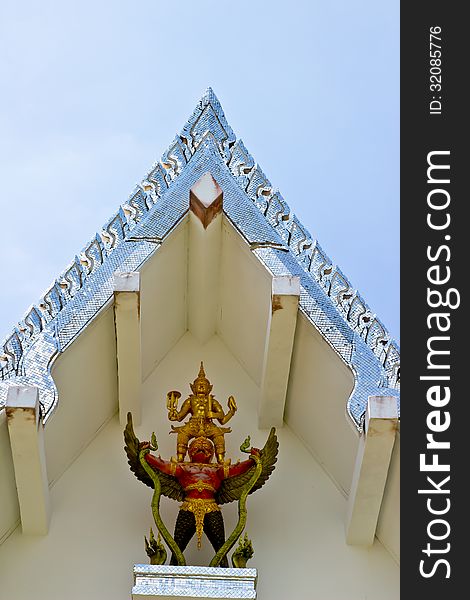 Detail Of giant statues on the roof Roof, Thailand.