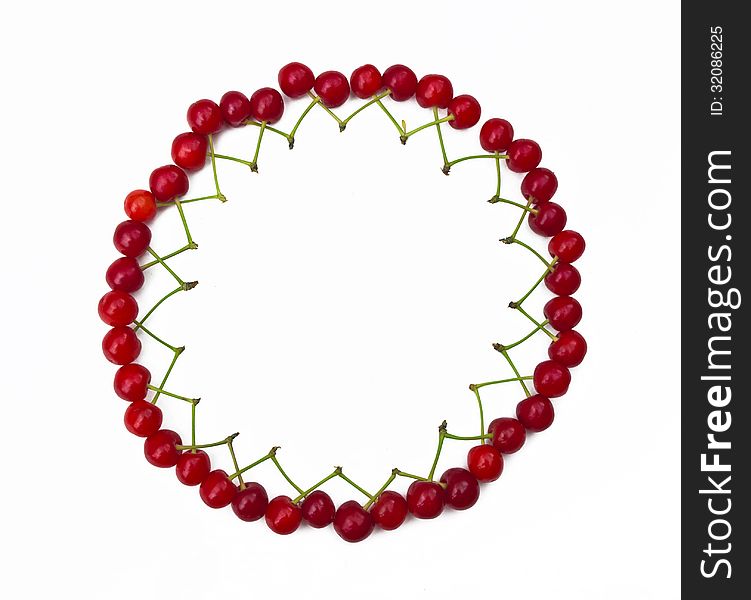 Round frame from cherries with place for text