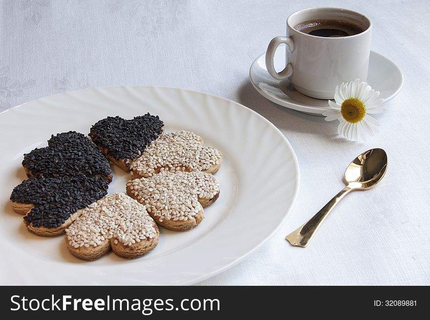 Cookies for the wedding with a cup of coffee