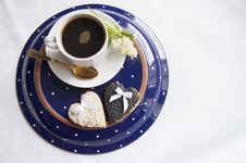 Two Wedding Cookies With A Cup Of Coffee On The Plate Stock Images Two Wedding Cookies With A Cup Of Coffee On The Plate Stock Images