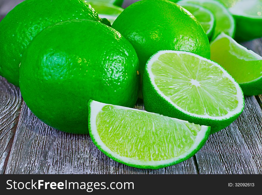 Limes on a wooden table