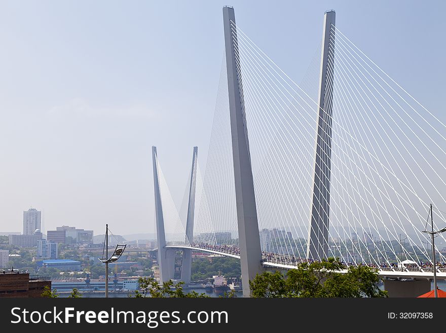 Large suspension bridge bright sunny day on the sea