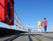 Strolling On Whitby Pier Stock Photos