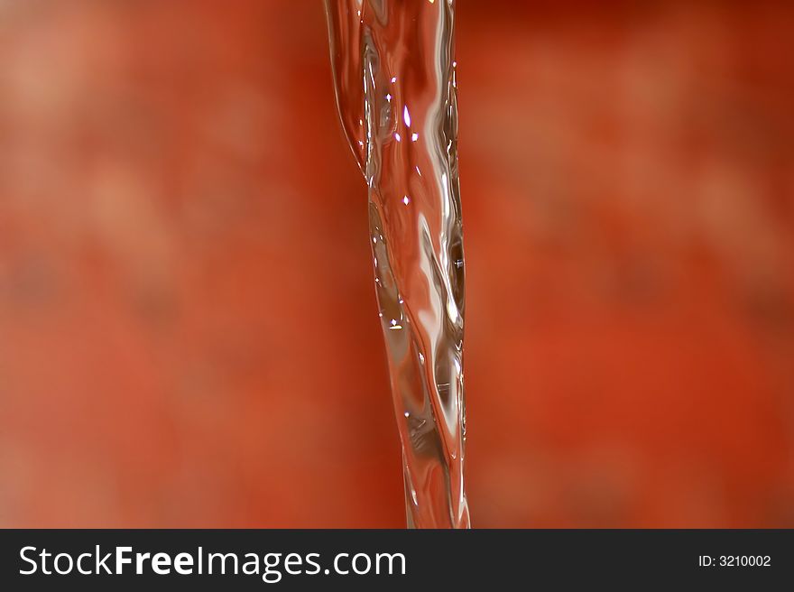 Abstract water flow detail on colored background