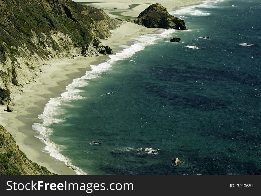 Waves crashing the California Coastline