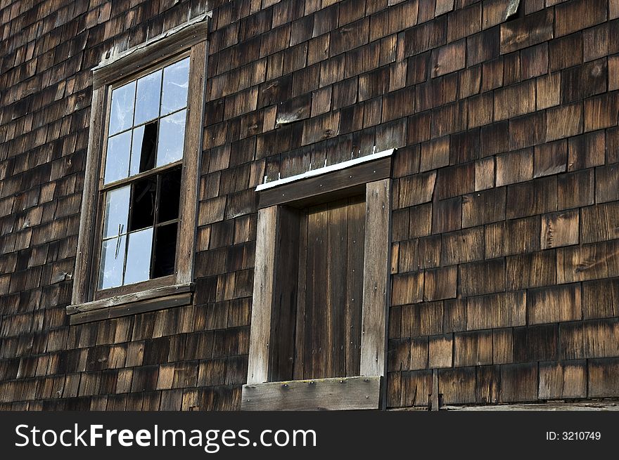 A 100 year old barn window on Denman Island BC. A 100 year old barn window on Denman Island BC