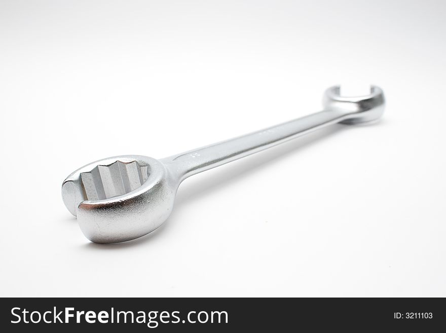 Wrench isolated on semi-white background