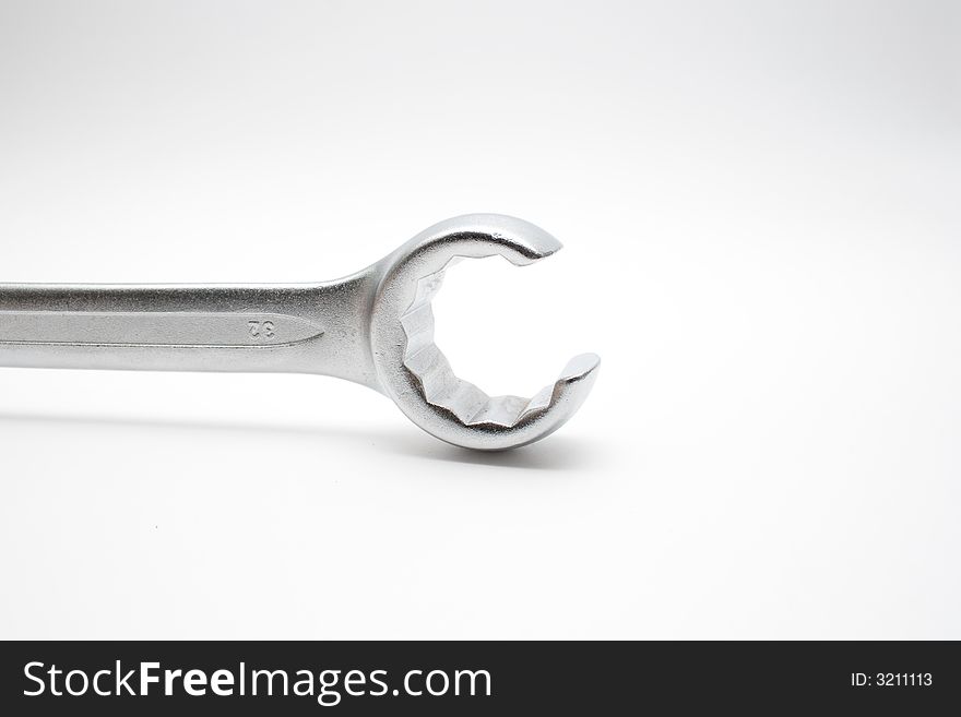 Wrench isolated on semi-white background