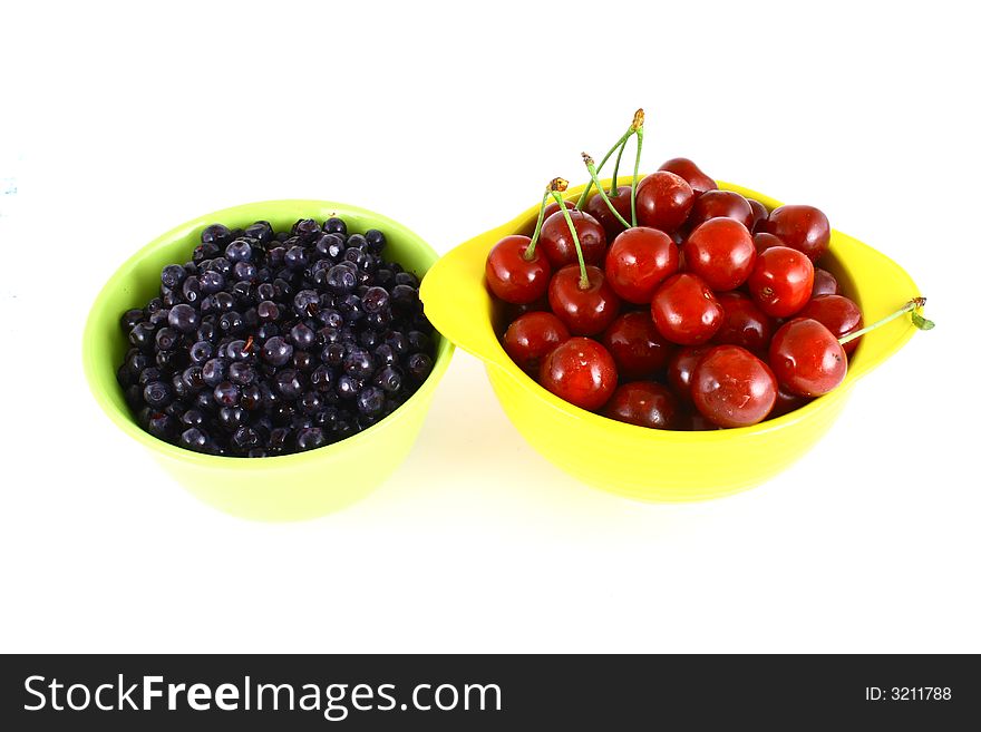Image of Cherries and blueberries isolated on white. Image of Cherries and blueberries isolated on white