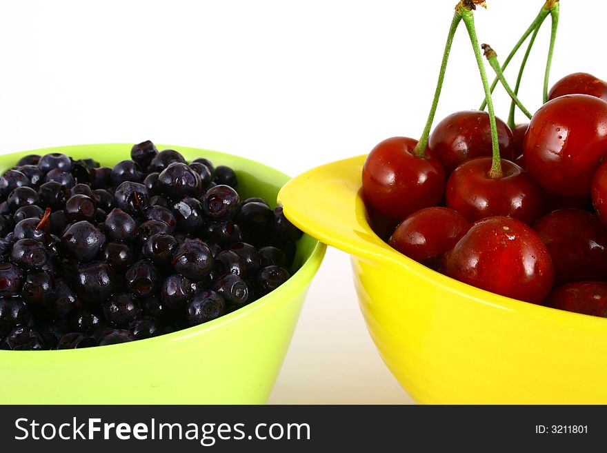 Image of Cherries and blueberries isolated on white. Image of Cherries and blueberries isolated on white