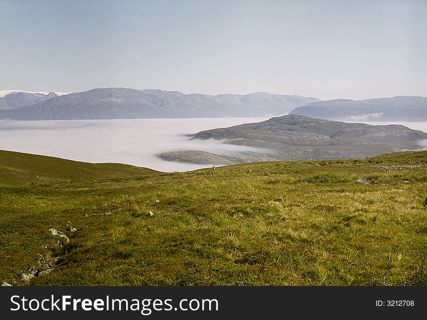 Sea Of Clouds Above An Island