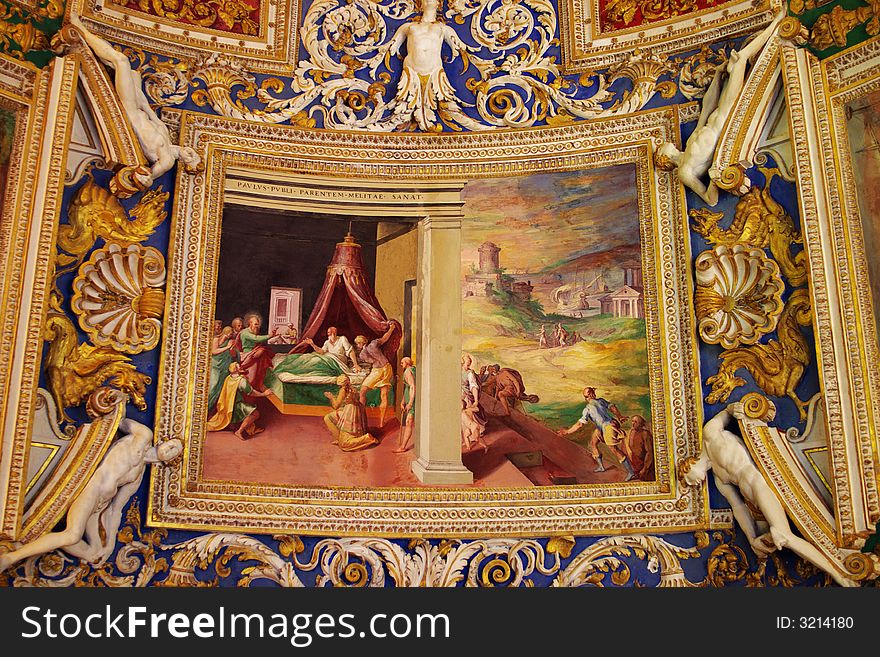 Golden decorations of church ceiling interior with religious theme. Rome, Italy. EU. Golden decorations of church ceiling interior with religious theme. Rome, Italy. EU