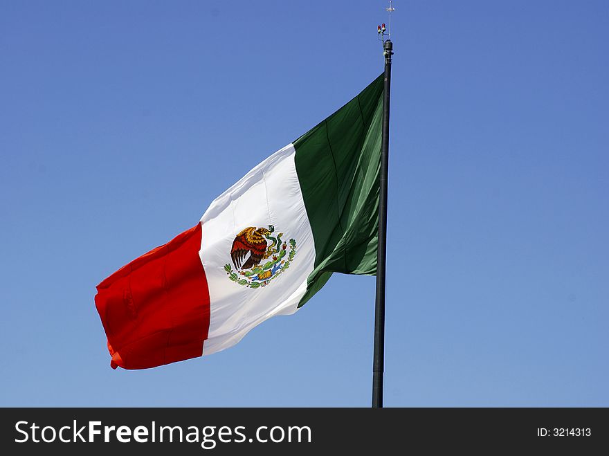 Mexican Flag, Independence day september 16:three equal vertical bands of green (hoist side), white, and red; the coat of arms (an eagle perched on a cactus with a snake in its beak) is centered in the white band