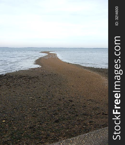 Shingle leading out to sea in Portsmouth. Shingle leading out to sea in Portsmouth