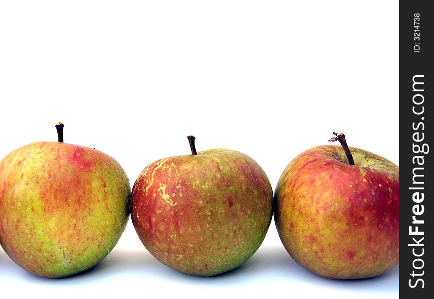 Three apples on a white background