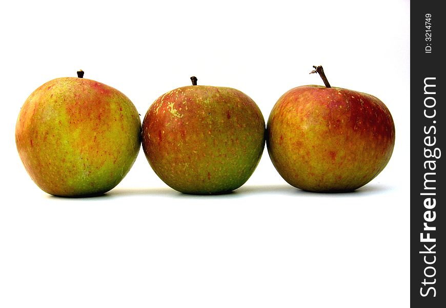 Three apples on a white background