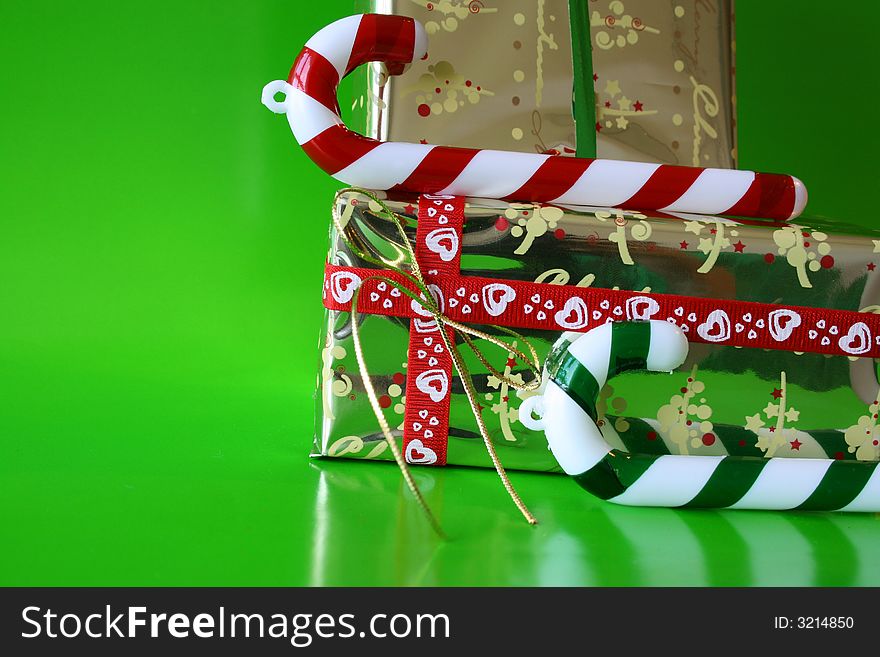 Christmas decorations as candy canes and wrapped gifts. Christmas decorations as candy canes and wrapped gifts