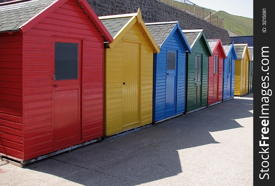 Colorful beach huts. Whitby, North Yorkshire, Uk. Colorful beach huts. Whitby, North Yorkshire, Uk.