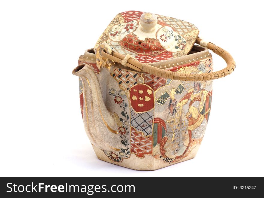 Ancient chinese teapot isolated on a white background. Ancient chinese teapot isolated on a white background.