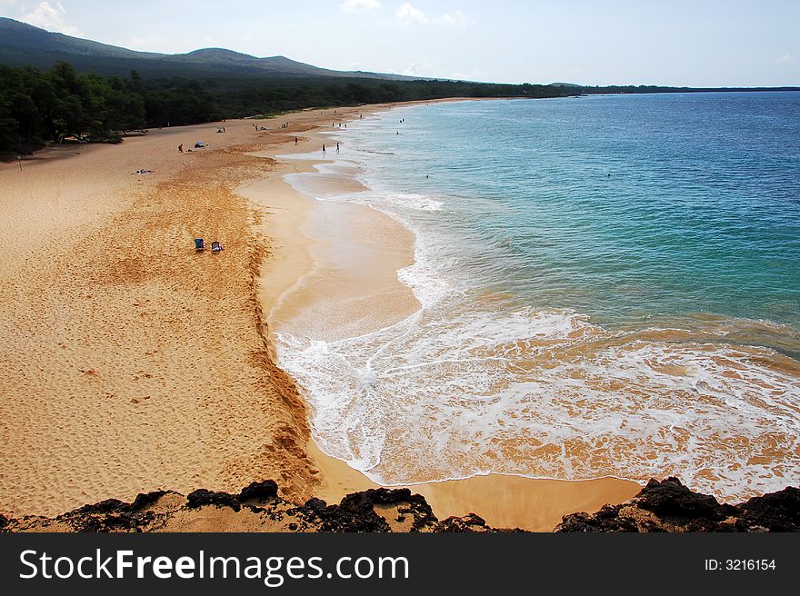 Waves rolling into the shore on Big Beach, Makena on the island of Maui. Waves rolling into the shore on Big Beach, Makena on the island of Maui